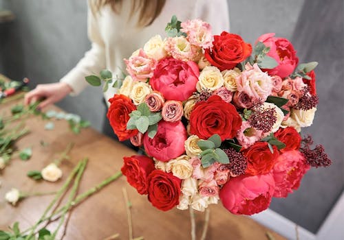 A bundle of red, pink and white roses, fresh from the designer's table