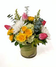 Funshine - Bright Spring Flowers in a Leaf Lined Vase