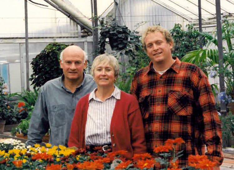 Three generations of VanderSalms work together in the greenhouse, circa 1985