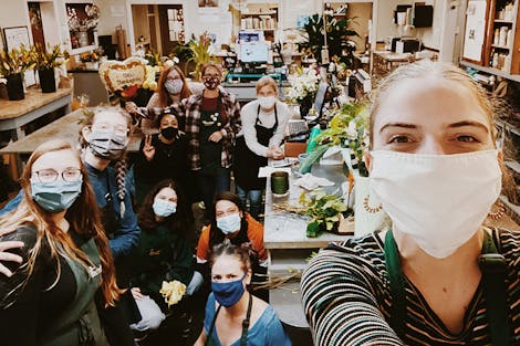 Our skilled team of floral designers, hard at work building your next beautiful arrangement